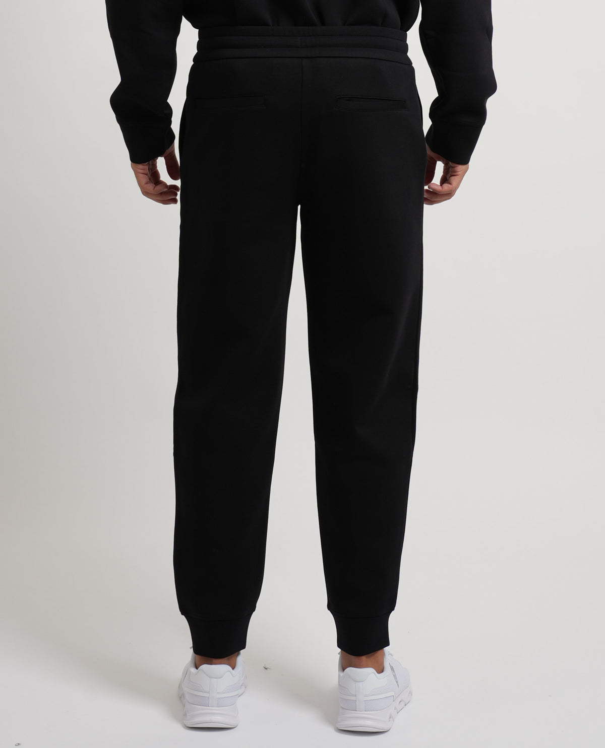 Pantaloni tuta Armani Exchange uomo con logo dorato 