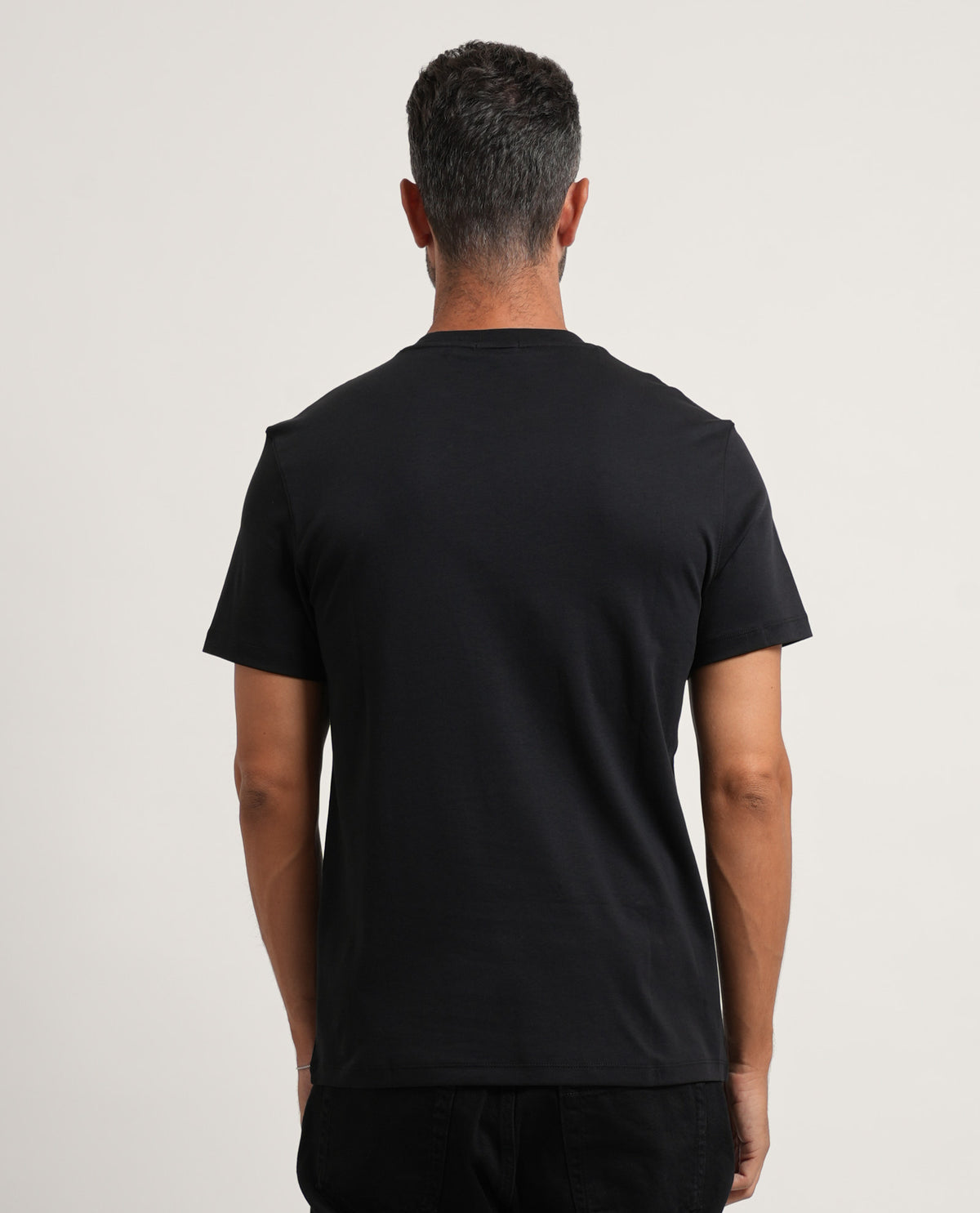 T-shirt slim in cotone con stemma Calvin Klein uomo 