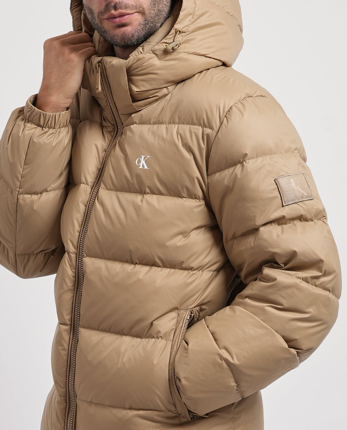 Piumino uomo Calvin Klein con cappuccio e logo 