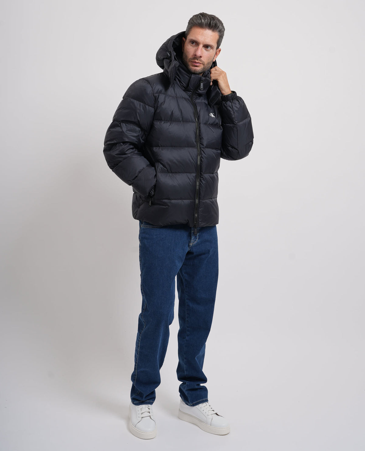 Piumino uomo Calvin Klein con cappuccio e logo 