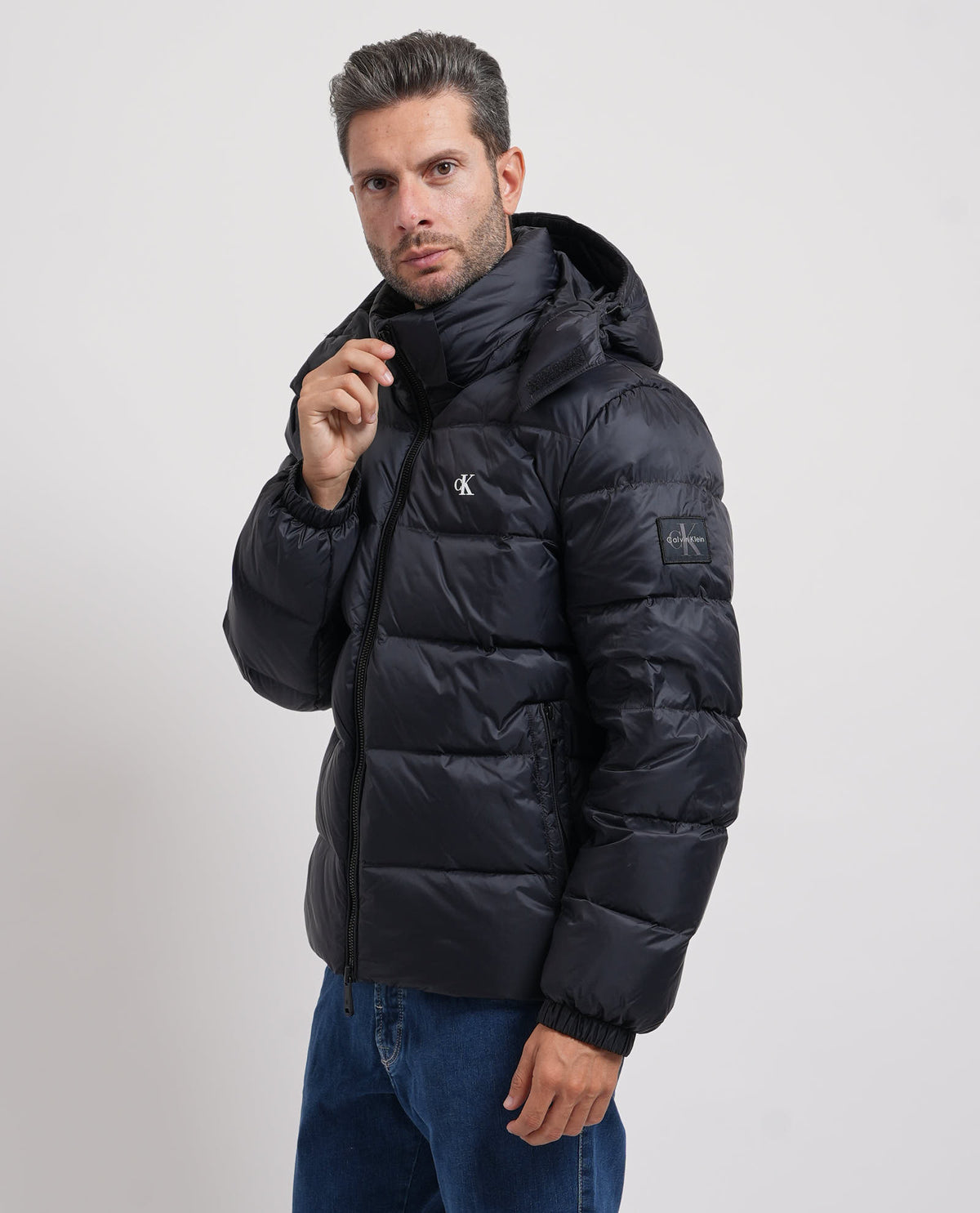 Piumino uomo Calvin Klein con cappuccio e logo 