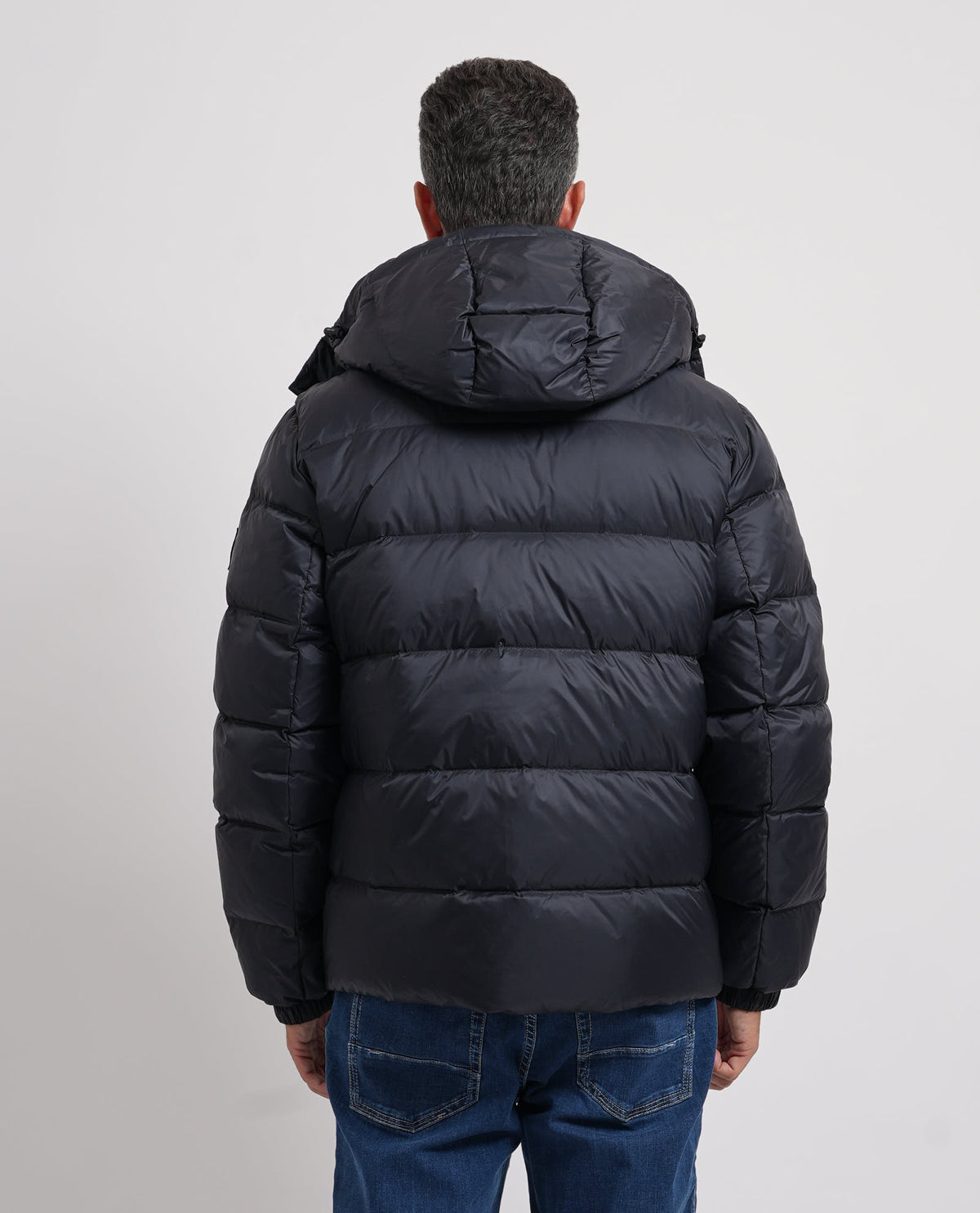 Piumino uomo Calvin Klein con cappuccio e logo 