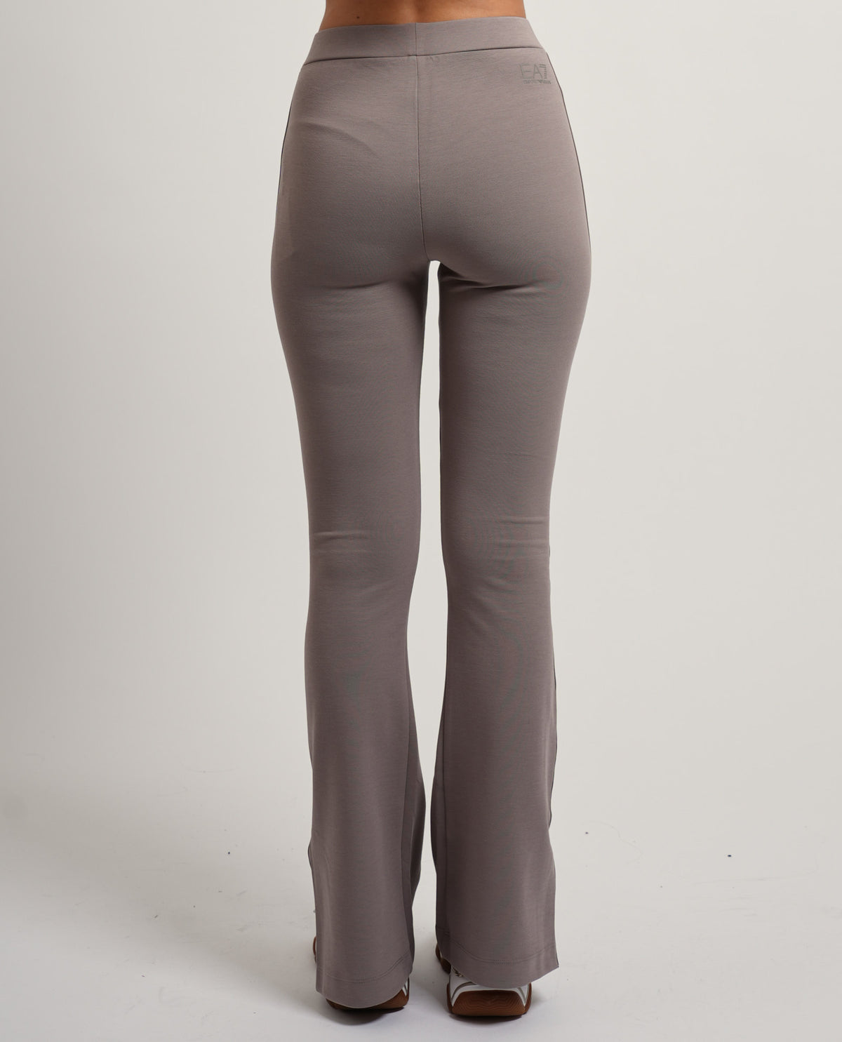 Pantaloni donna EA7 con banda laterale logata 