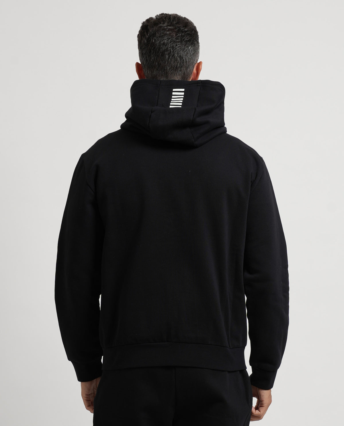 Tuta in cotone EA7 uomo con cappuccio e zip 